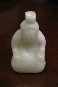 A white jade carved figure