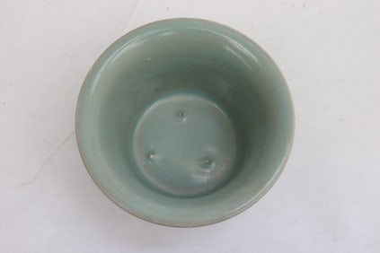 A celadon porcelain wine cup
