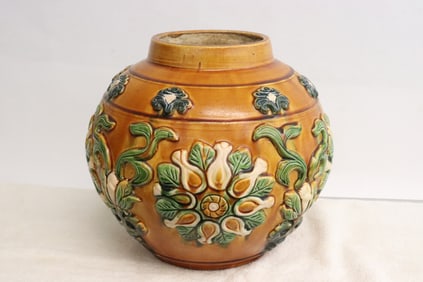 A sanci earthenware jar with decoration in relief