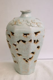 A celadon meiping with pierced decoration
