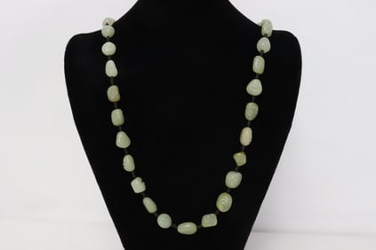 A jade bead necklace