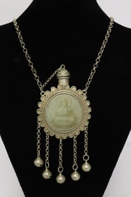 A white bronze scent bottle