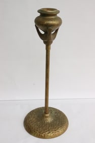 A rare art nouveau gilt metal tall candle holder