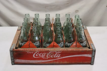 Case of twenty four 1950's Coca Cola bottles