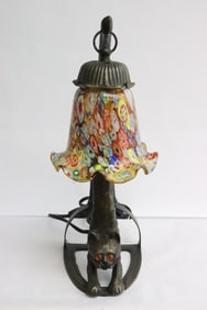 A bronze based lamp w/ Millefiori style lamp shade