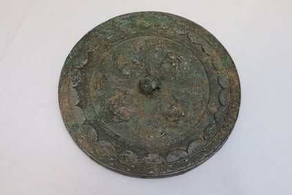 An important Tang dynasty bronze mirror, c900AD