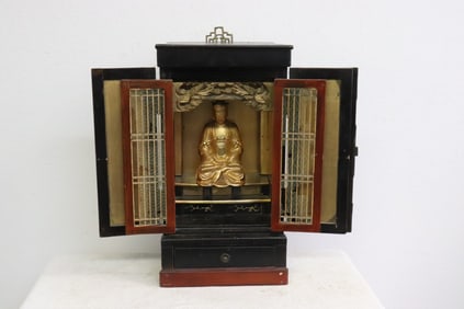 Japanese shrine with gilt wood deity inside
