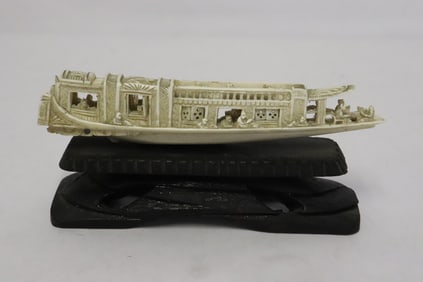 Chinese bone carved boat on stand