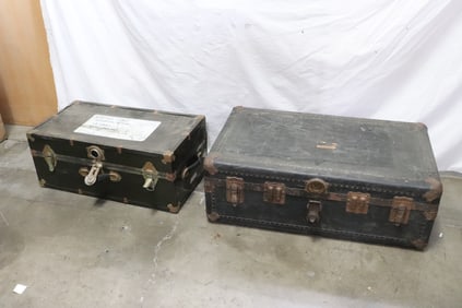 A military trunk, and an old trunk