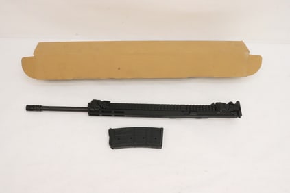 A 410 upper barrel with one 9RD magazine