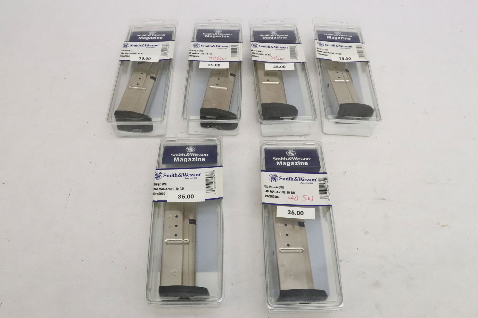 Three 9mm 10RD magazines, and three 0.40 10RD magazines by Smith Wesson: Three 9mm 10RD magazines, and three 0.40 10RD magazines by Smith Wesson