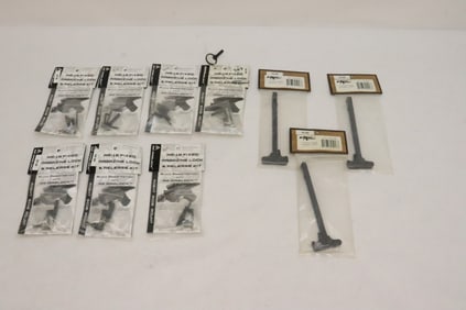 3 charging handles (22ARC), and 7 AR-15 fixed magazine lock and release kits