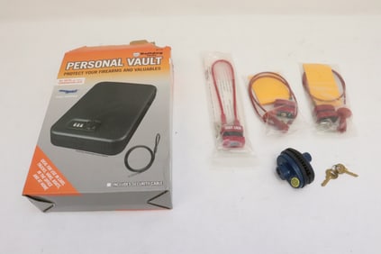 4 gun locks, and a pistol vault