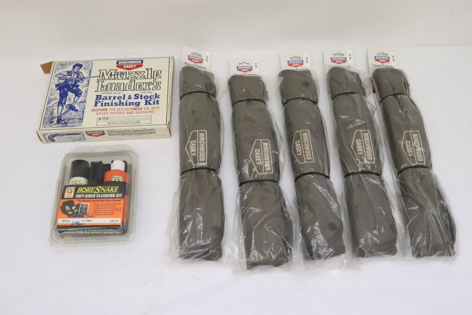 5 rifle casey, and 2 gun cleaning kits: 5 rifle casey, and 2 gun cleaning kits