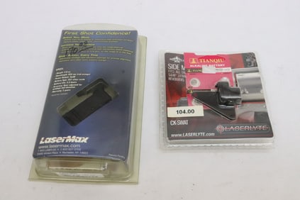 Laserlyte side mount laser, & a Lasermax rail mount laser