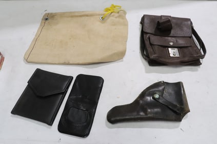 Leather gun holster, leather pouch, a canvas water bag(?)