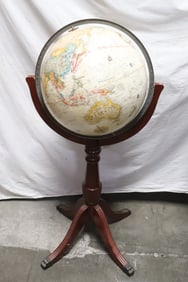 A floor standing globe