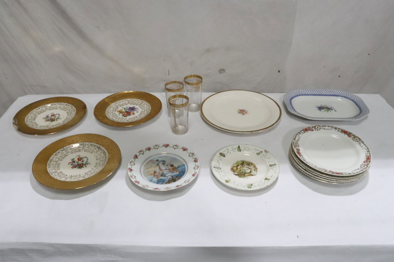 Lot of porcelain plates: Lot of porcelain plates (0.75"x8.2"dia - 1.3"x12.65"x9"); Copeland, Wedgwood, and 3 French gilt crystal waters (5"x2.7"dia ea)