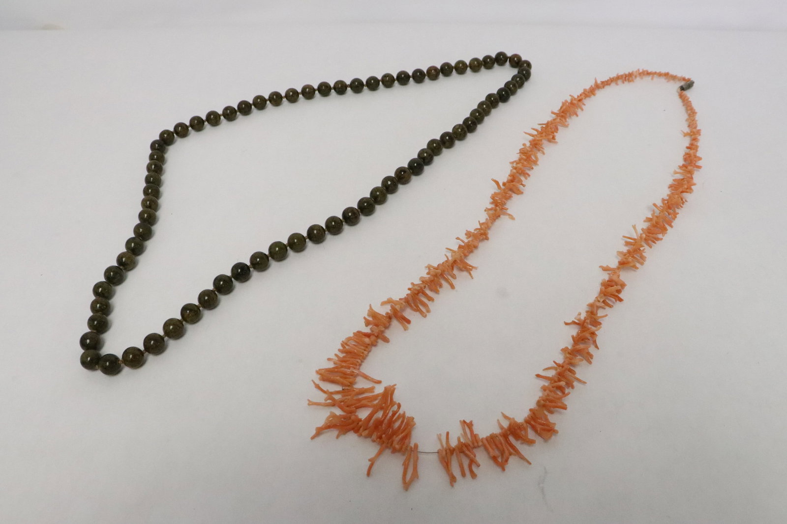 2 necklaces: 2 necklaces; a tiger eye bead (~ 10mm diameter) necklace, and a coral necklace, NO INTERNATIONAL SHIPPING OF CORAL