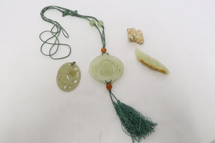 4 stone carved ornaments