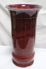 A massive Chinese red glazed porcelain umbrella stand
