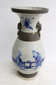 A crackleware blue and white trumpet vase
