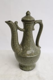 A crackleware porcelain wine server