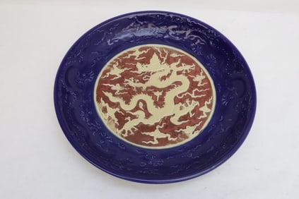 A fahua style charger with blue glazed border