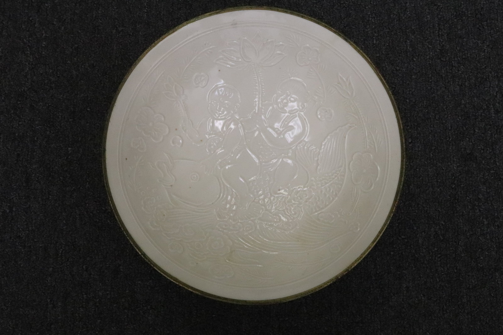 Song style white porcelain bowl: Song style white porcelain bowl embossed with birds and flowers motif decoration, 2.4"x9"dia
