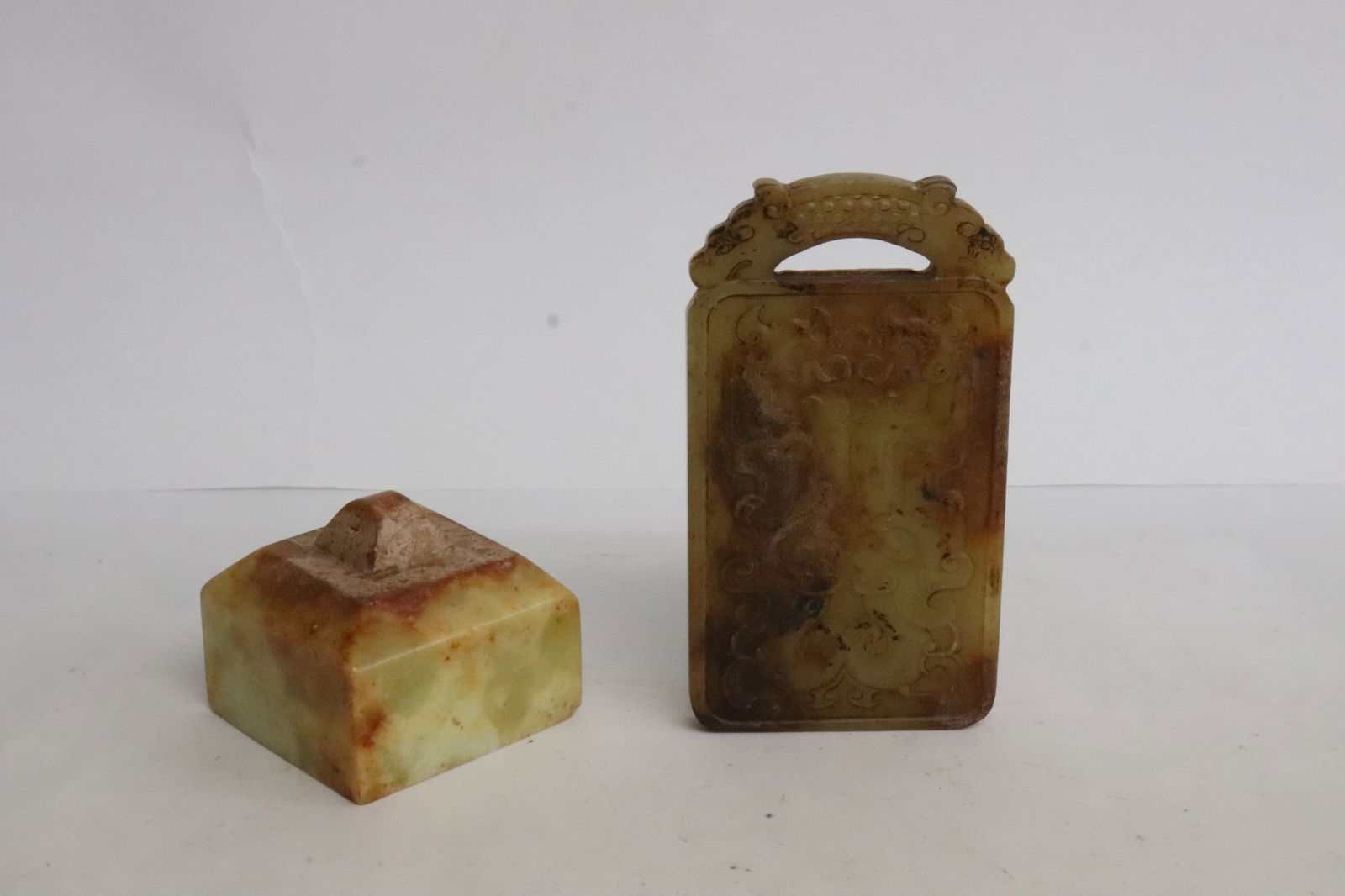 2 jade like stone carvings; a plaque, and a seal (1 of 9)