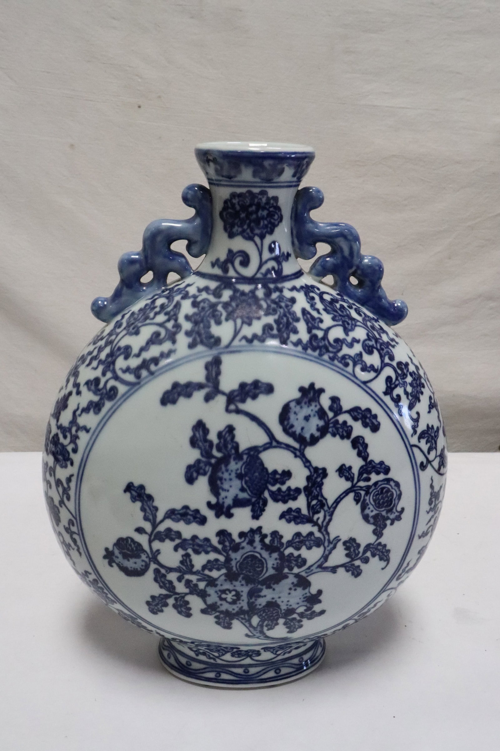 A blue and white porcelain flask: A blue and white porcelain flask, 14.1"x10.5"x5.6"