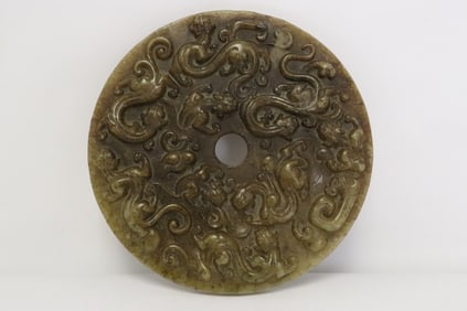 Large stone carved disc