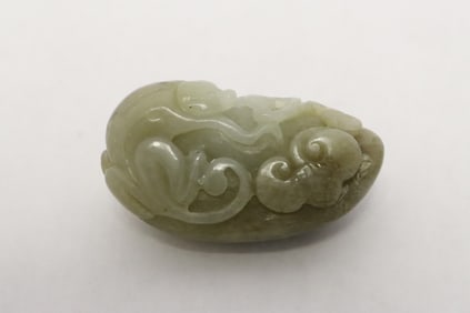 Jade carved ornament with decoration in relief