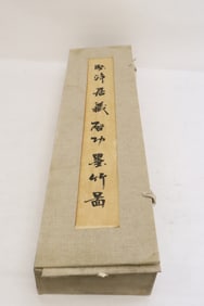 3 print scrolls in storage box