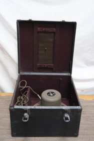 A vintage Bell and Howell speaker