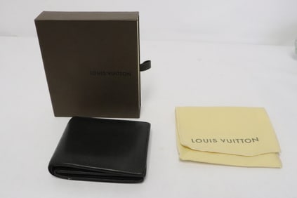 Genuine Louis Vuitton wallet w/ original receipt