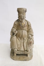 A Ming wood carved deity, c1600AD