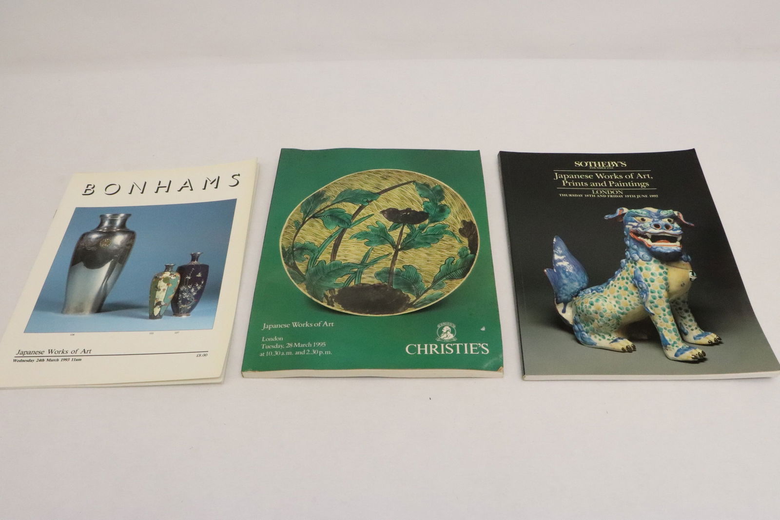 3 auction catalogs for Japanese antiques: 3 auction catalogs for Japanese antiques (10.35"x8.2"x0.05" - 10.65"x8.2"x0.3"); including Japanese swords and sword mounts