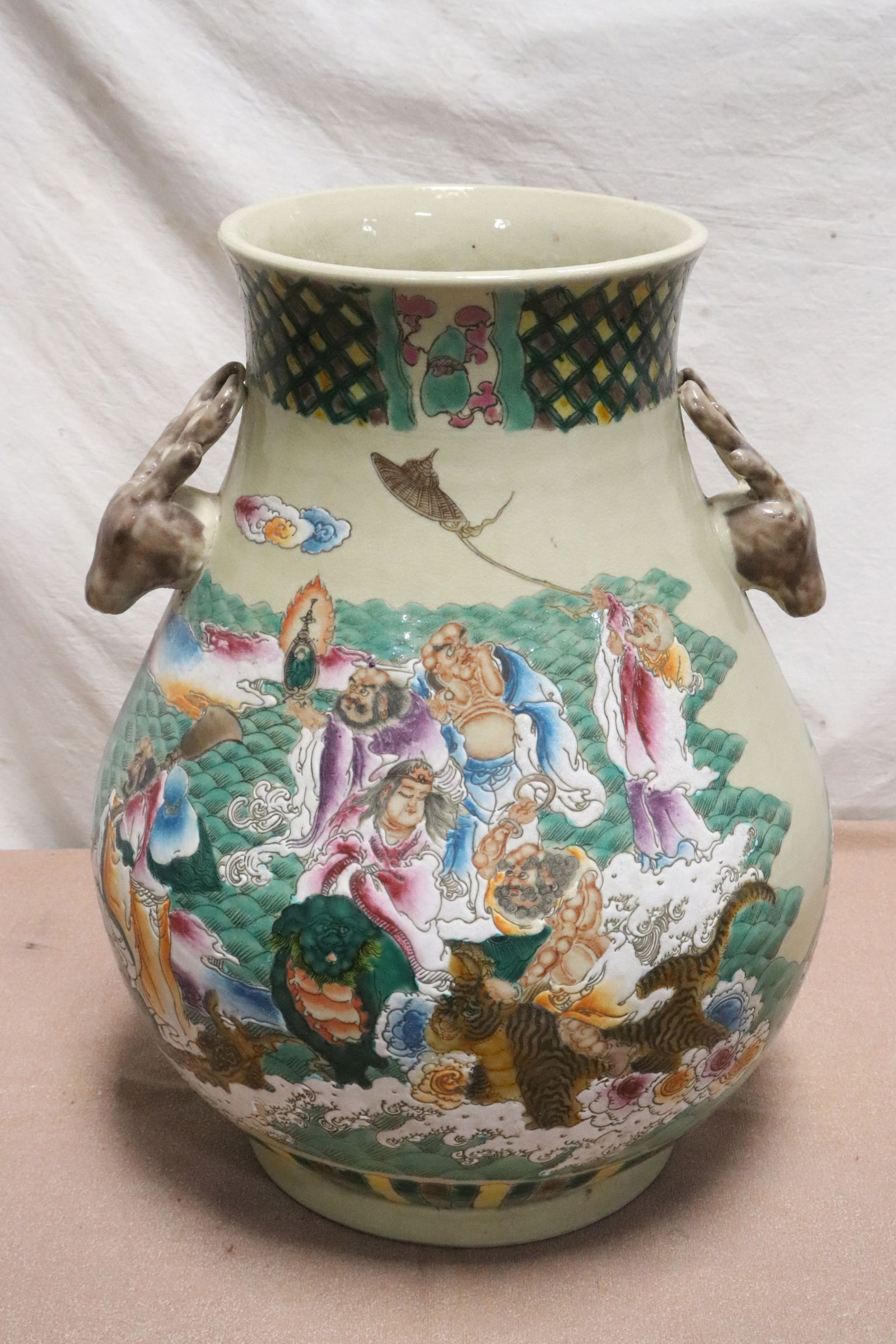 Massive Chinese famille rose porcelain jar: Massive Chinese famille rose porcelain jar with deer motif handles, 17"x13.1"dia