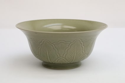 Celadon bowl embossed w/ floral motif decoration