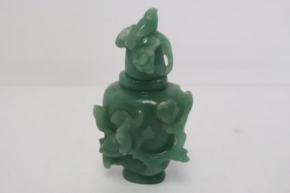 A natural aventurine carved covered bottle