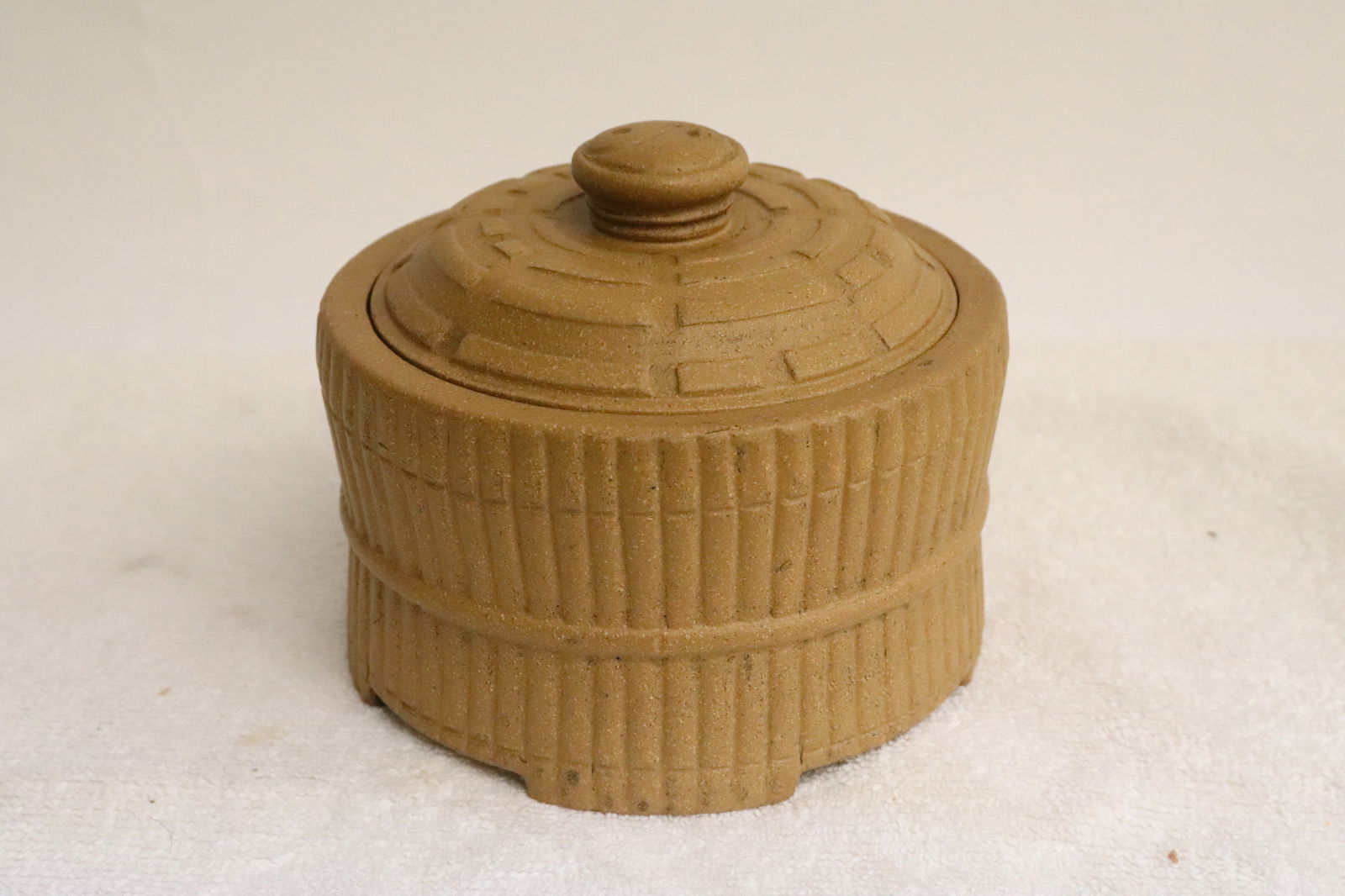 A Yixing clay tea caddy: A Yixing clay tea caddy, 3.7"x4.3"dia