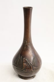 A Japanese shakudo bronze vase