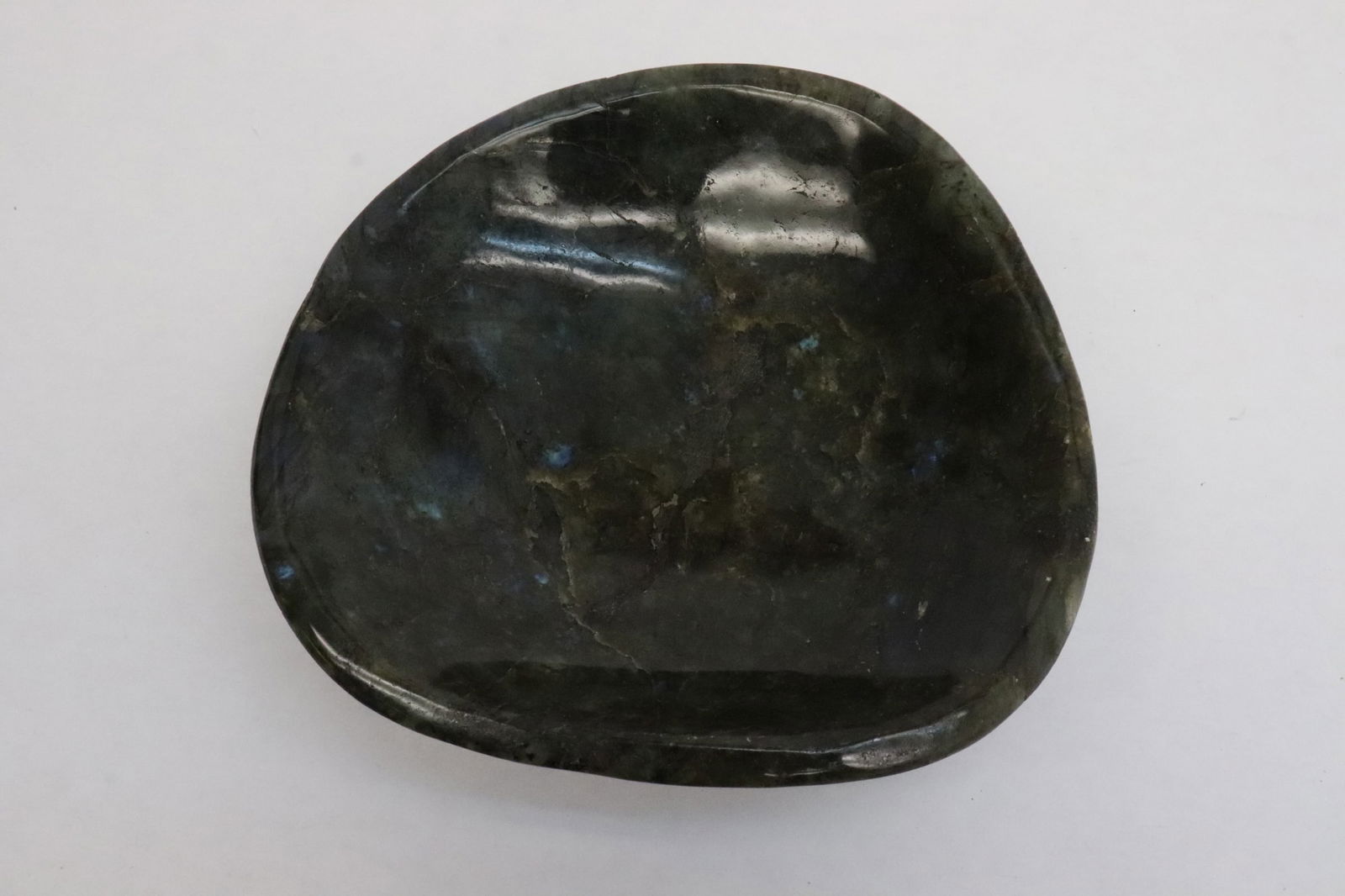 A polished labradorite stone bowl: A polished labradorite stone bowl, 2.6"x7.4"x7.7"