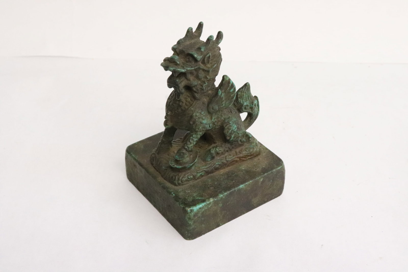 Bronze seal with qilin motif finial: Bronze seal with qilin motif finial, 3.35"x2.35"x2.35"