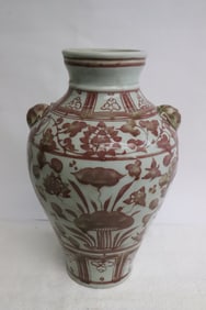 A red and white porcelain jar