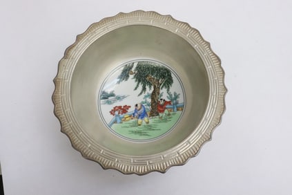 A silver rimmed porcelain bowl
