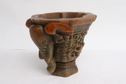 A horn style libation cup