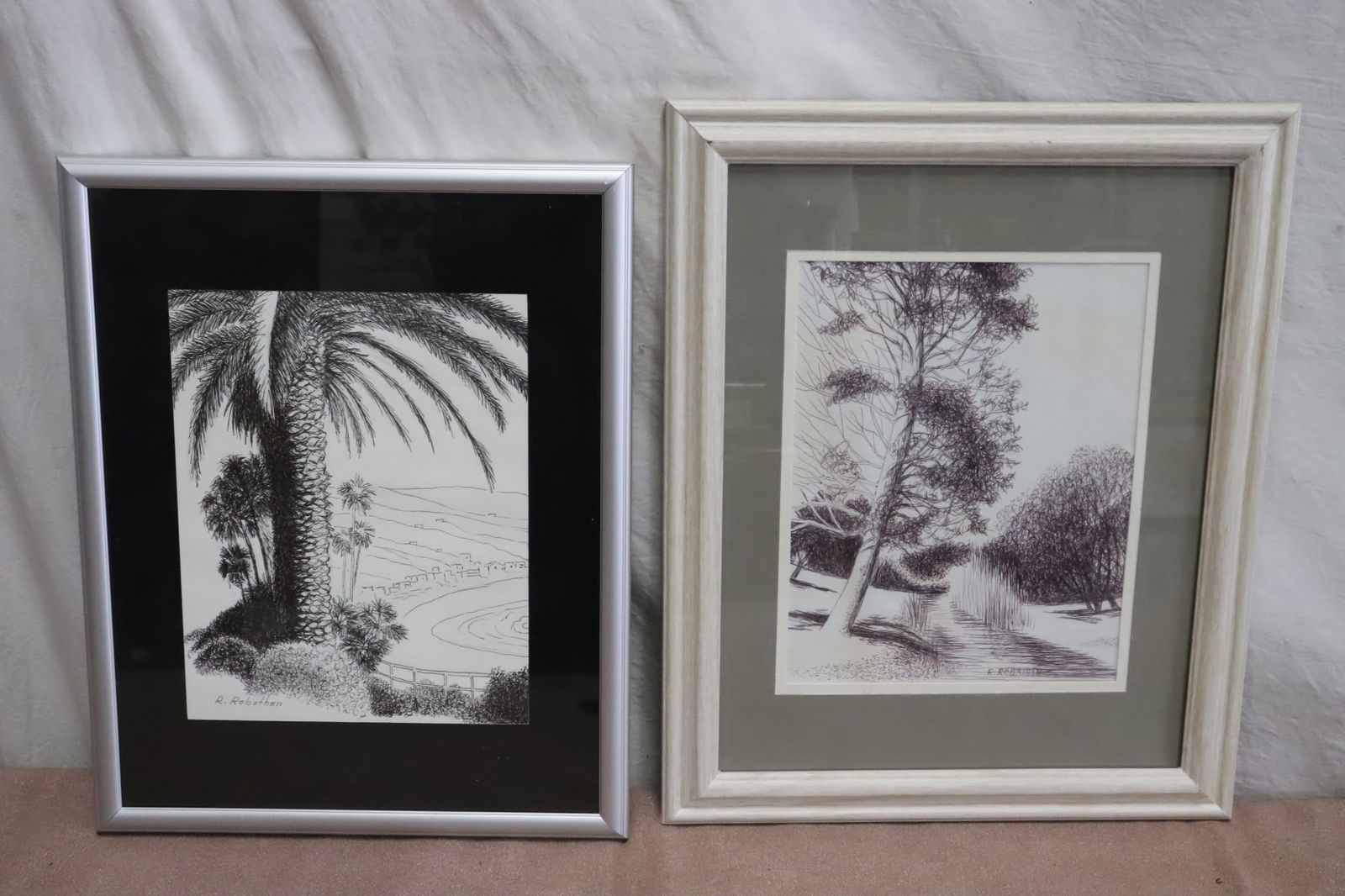 2 ink on paper "Riverside scenes" by Robert Robathan: 2 ink on paper "Riverside scenes" by Robert Robathan, 9.5"x7.5" (F:15"x11.9"x0.85"), 9.5"x7.4" (F:16.15"x13.2"x0.75")