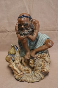 A Shiwan yao bisque sculpture, artist signed